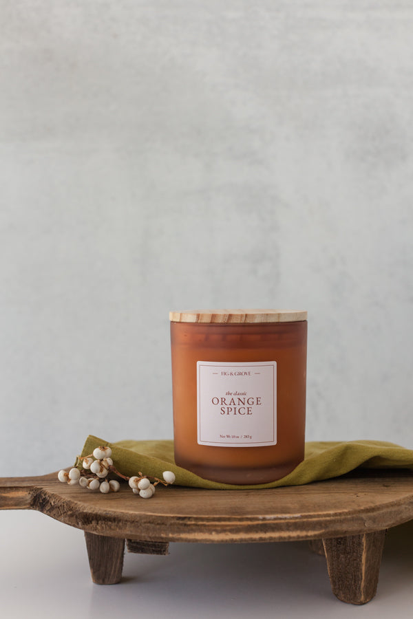 Orange Spice 100% soy wax candle in a 10 oz glass jar