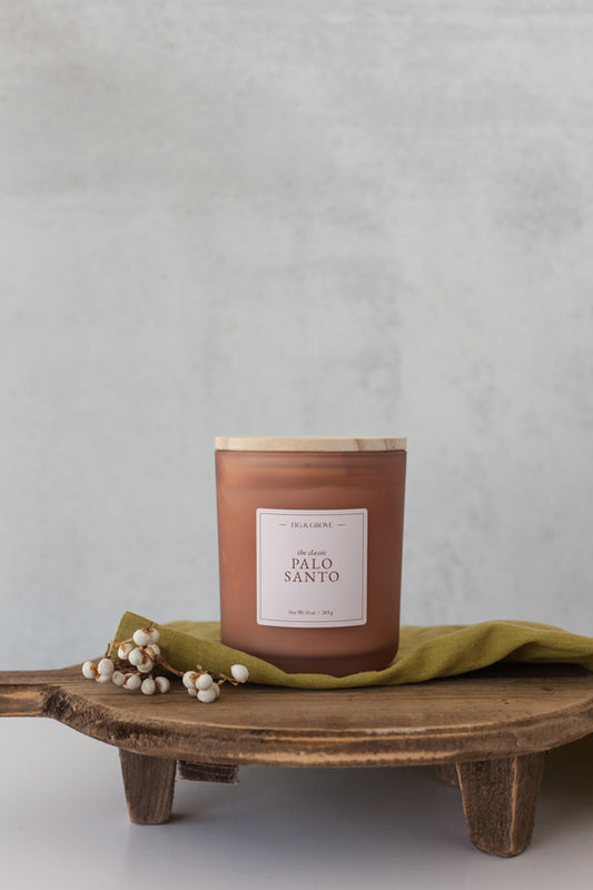 Grounding Palo Santo soy wax candle in 10 oz glass jar