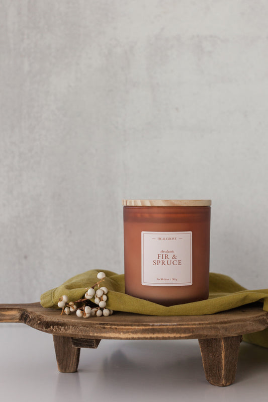 Fir & Spruce candle in brown glass jar evoking fresh pine and winter woods – Fig & Grove