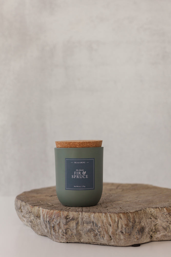 Fir & Spruce candle in sage green glass jar evoking fresh pine and winter woods – Fig & Grove