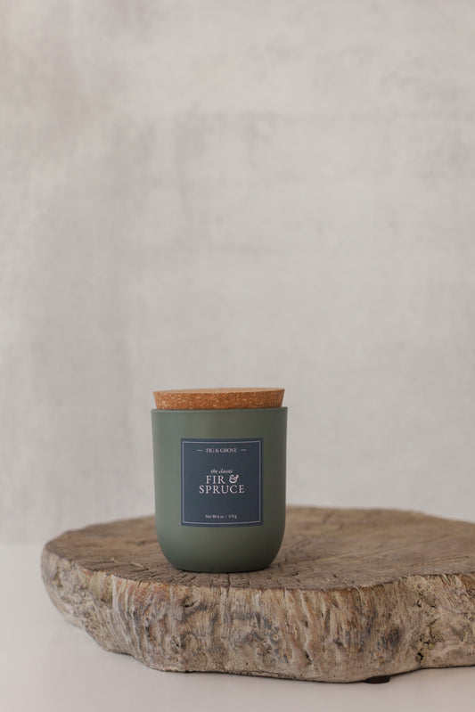 Fir & Spruce candle in sage green glass jar evoking fresh pine and winter woods – Fig & Grove