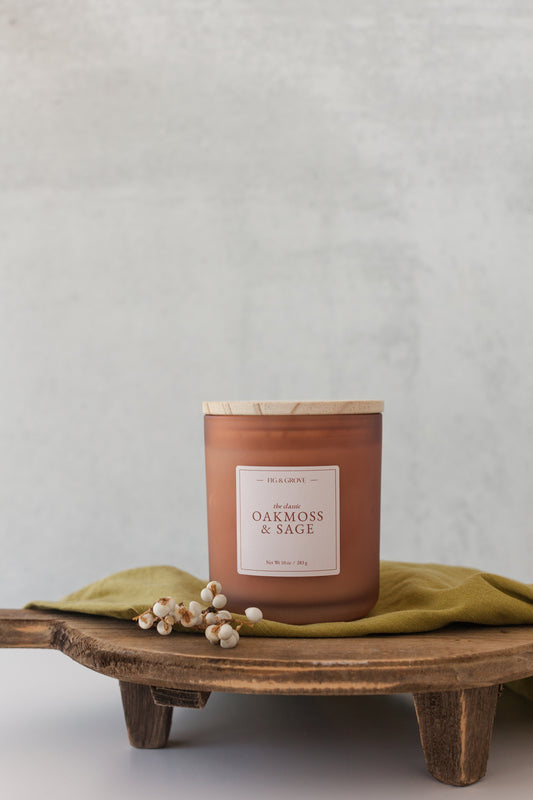 Hand-poured Oak Moss & Sage candle in frosted glass vessel – earthy essential oil blend with notes of sage, citrus, and oakmoss